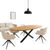 Deens Ovale mangohouten eettafel met zwart metalen spin poot en beige draaistoelen in moderne woonkamer opstelling.
